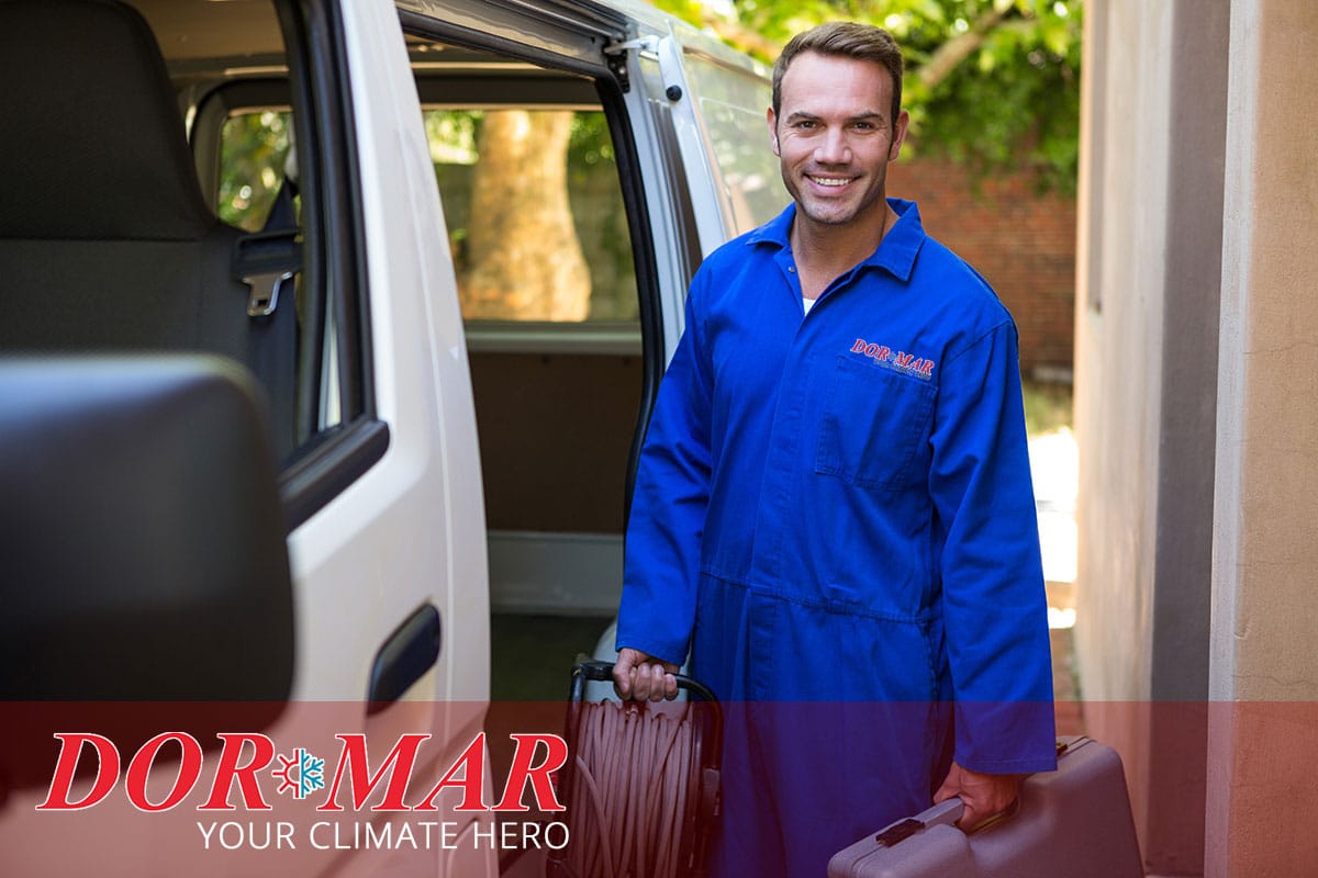 AC spring tune-up Dor-Mar service tech