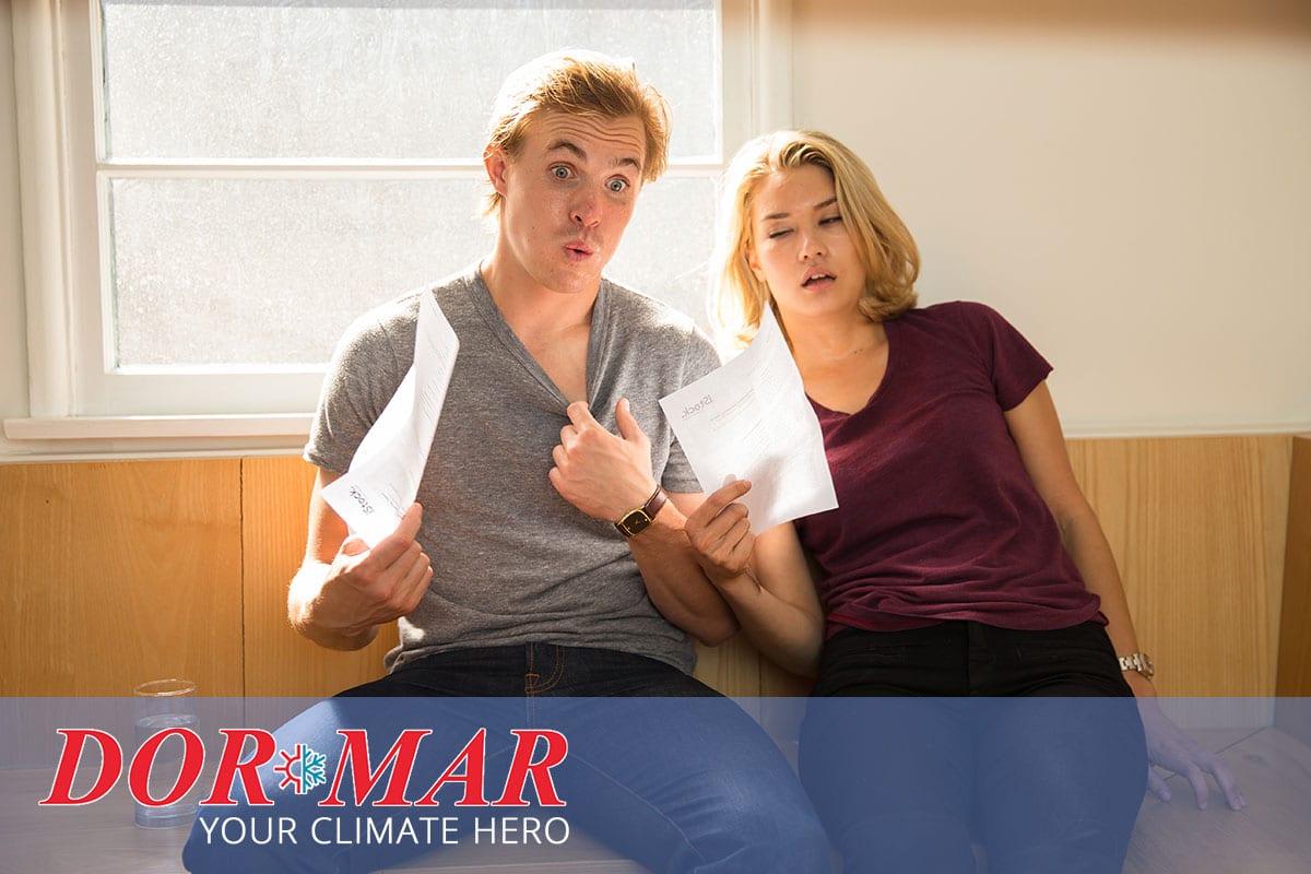 How do high temperatures outdoors affect my air conditioner performance?