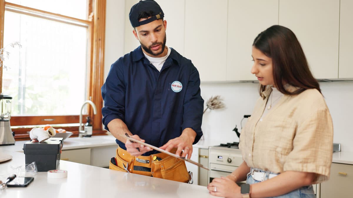 Dor-Mar technician reviews estimate with a customer